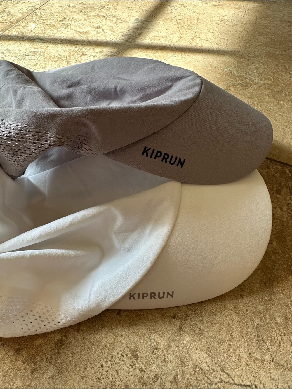 2 kiprun running Hats — White and Gray